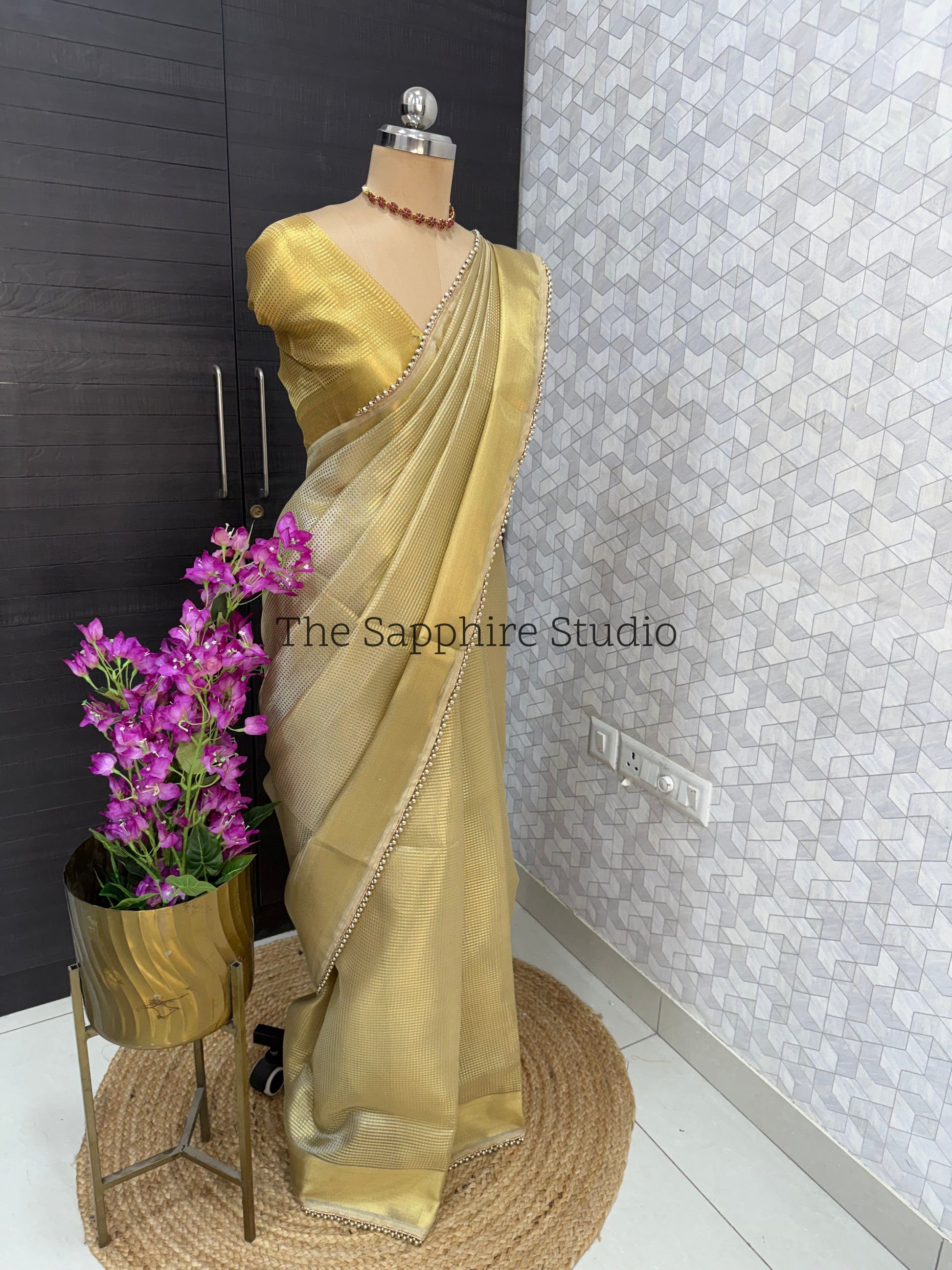 Tissue golden shade saree with lace border