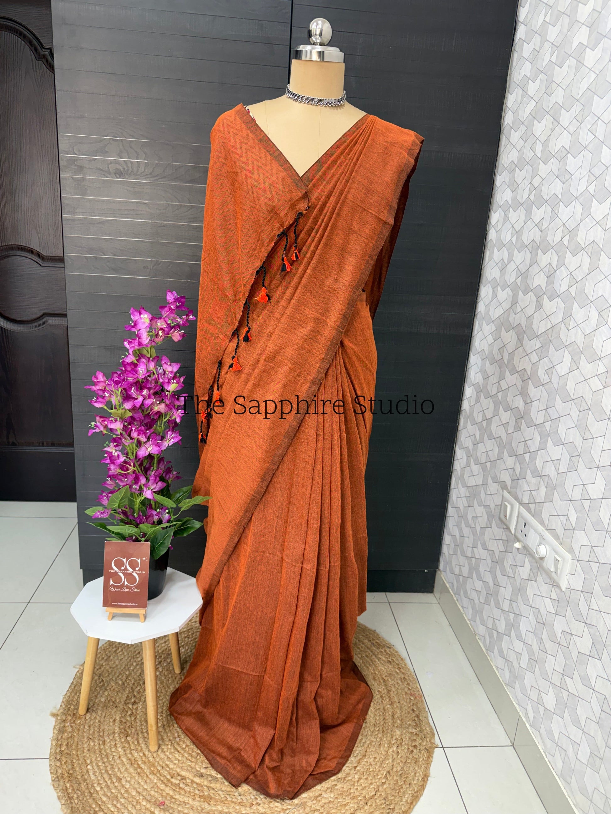 Rust Orange khadi cotton saree with Geometric Contrast Blouse
