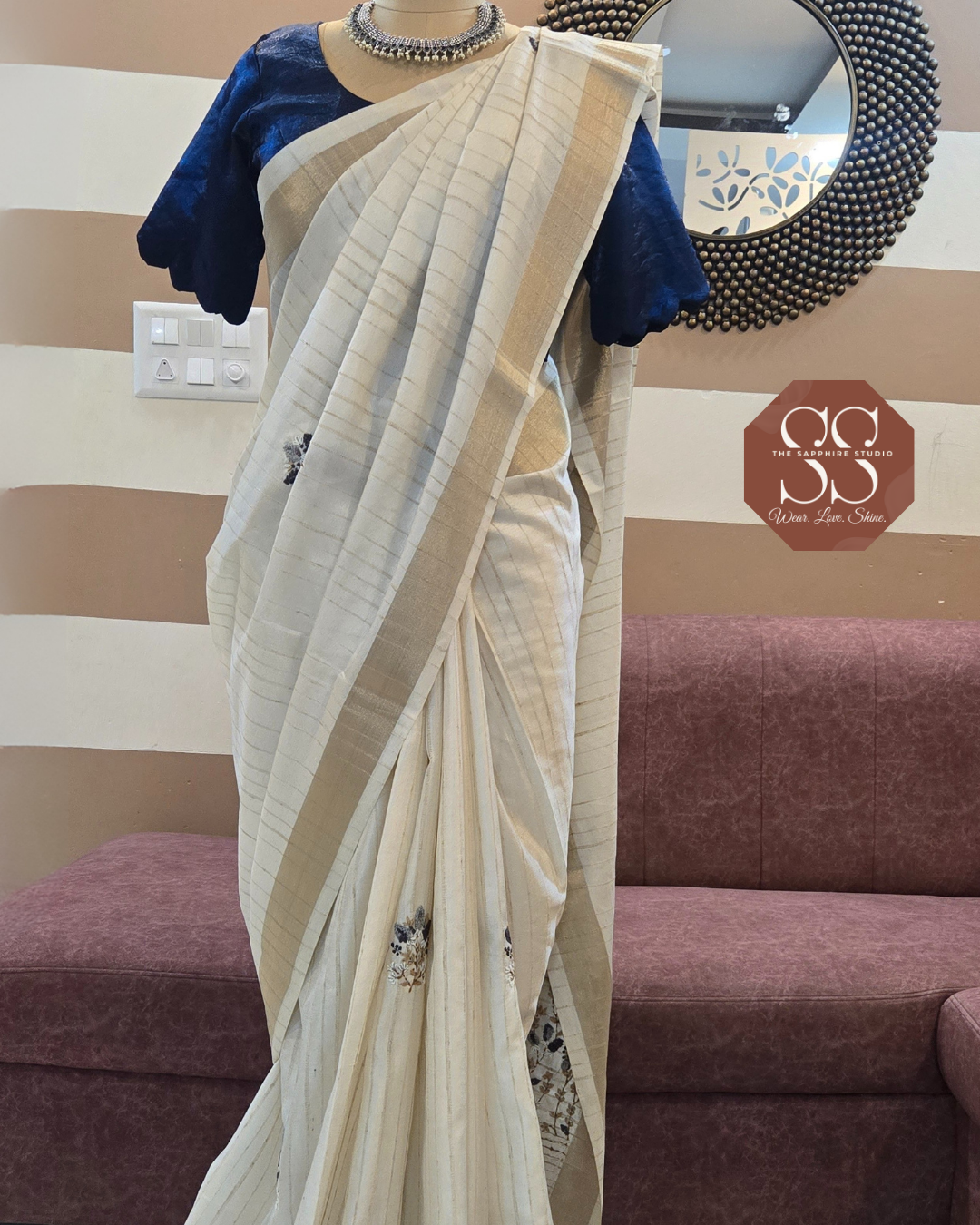 Styled Look: Tussar Saree with Hand Embroidery & Gold Border + Navy Blue Ready-Made Blouse