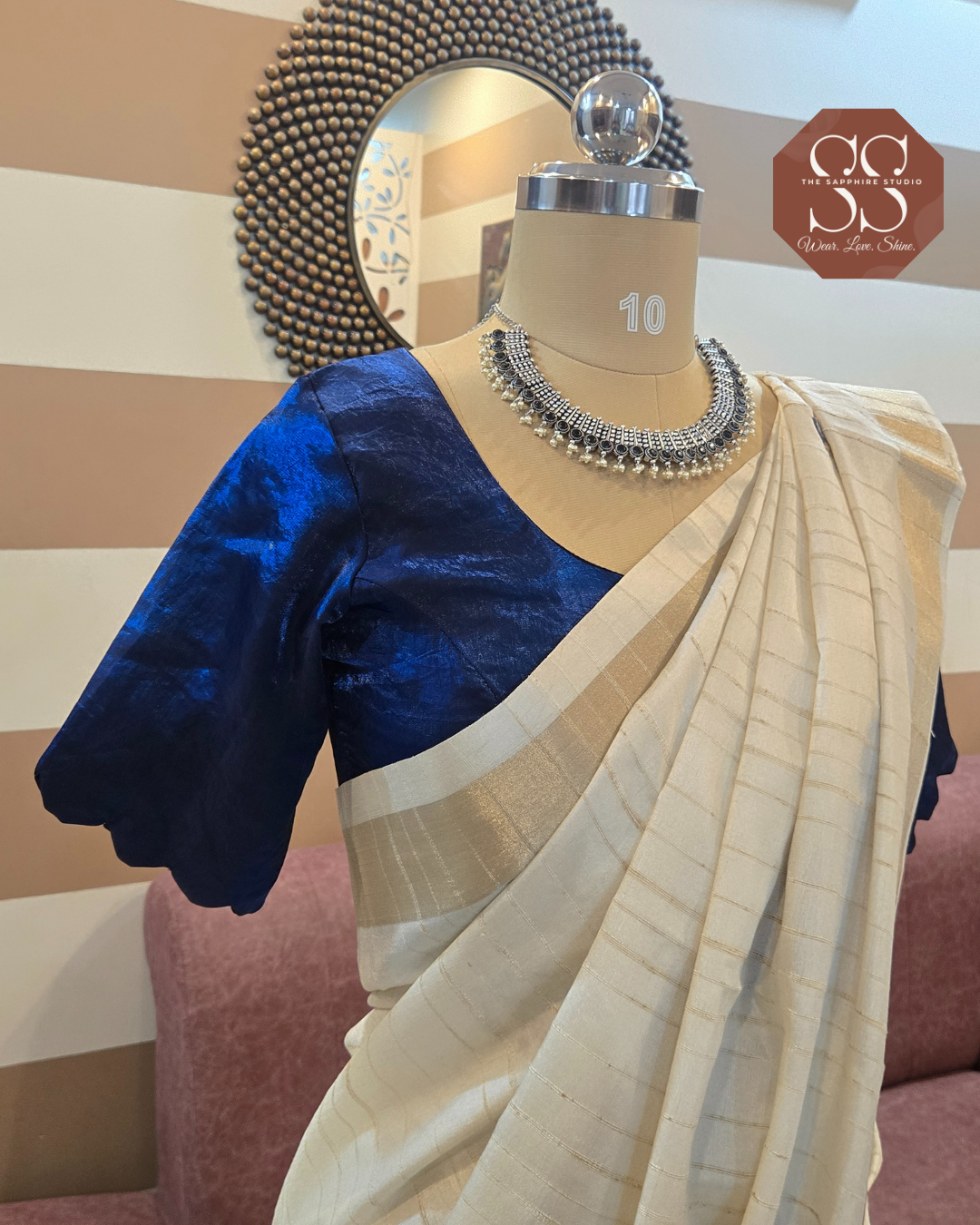 Styled Look: Tussar Saree with Hand Embroidery & Gold Border + Navy Blue Ready-Made Blouse