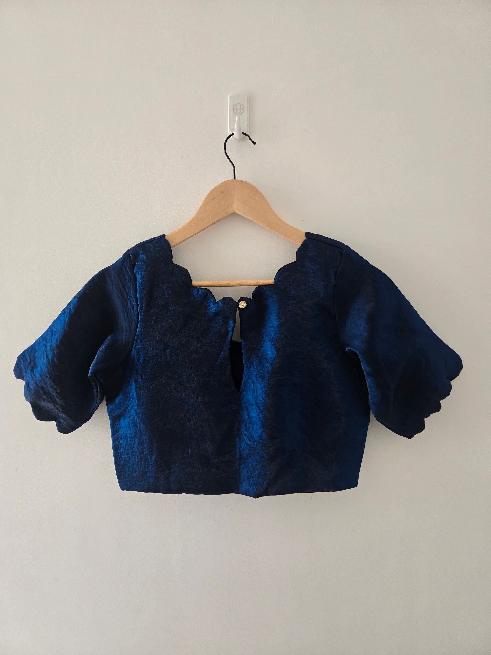 Styled Look: Tussar Saree with Hand Embroidery & Gold Border + Navy Blue Ready-Made Blouse