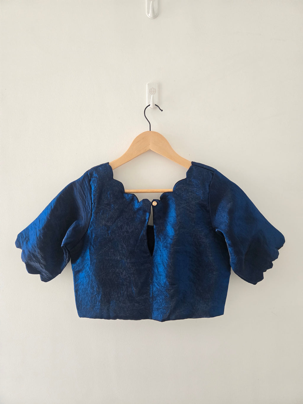 Onam Tussar Saree – Hand Embroidery & Elegant Lace Border with the paired navy scallop blouse