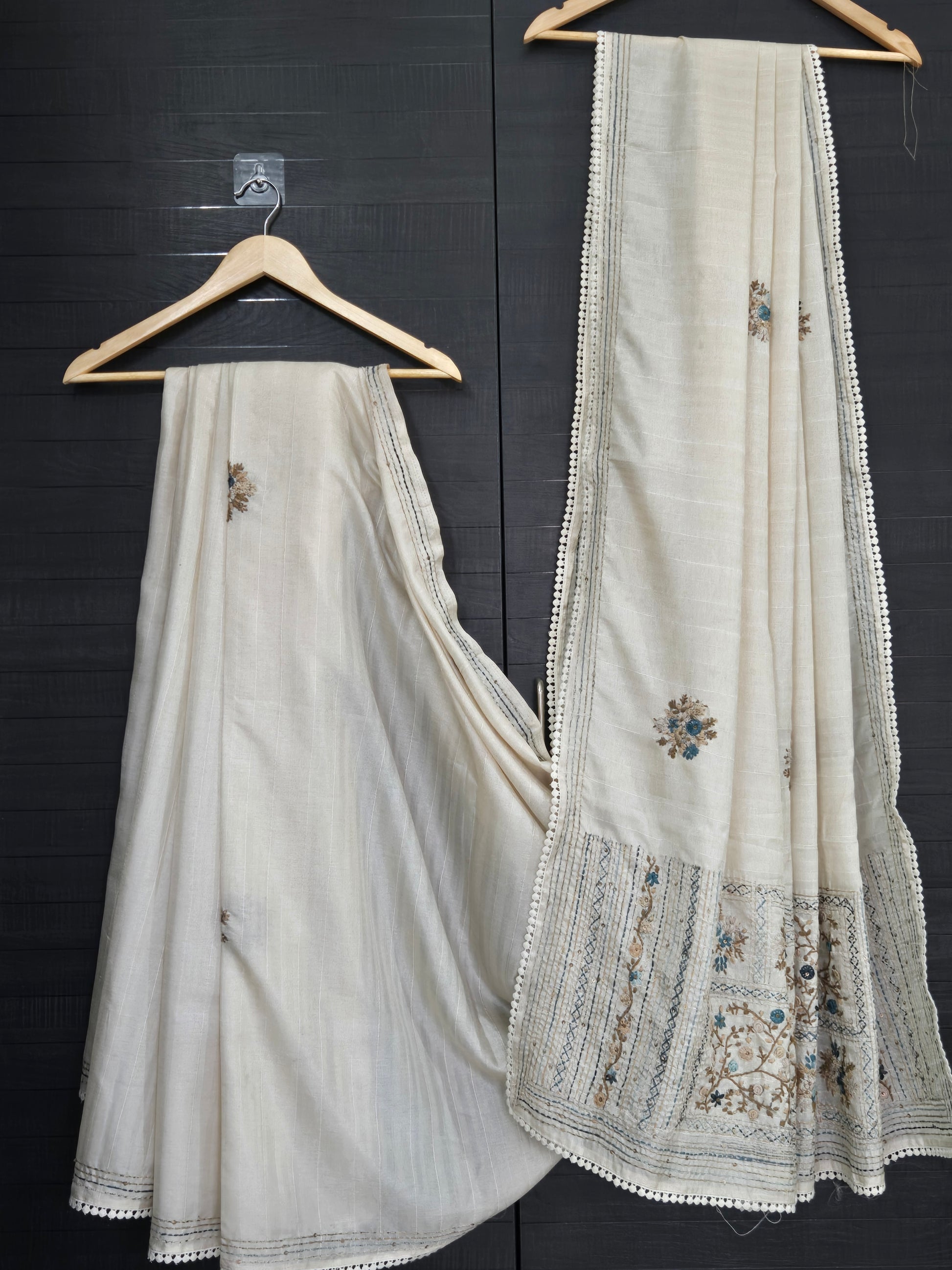 Onam Tussar Saree – Hand Embroidery & Elegant Lace Border with the paired navy scallop blouse