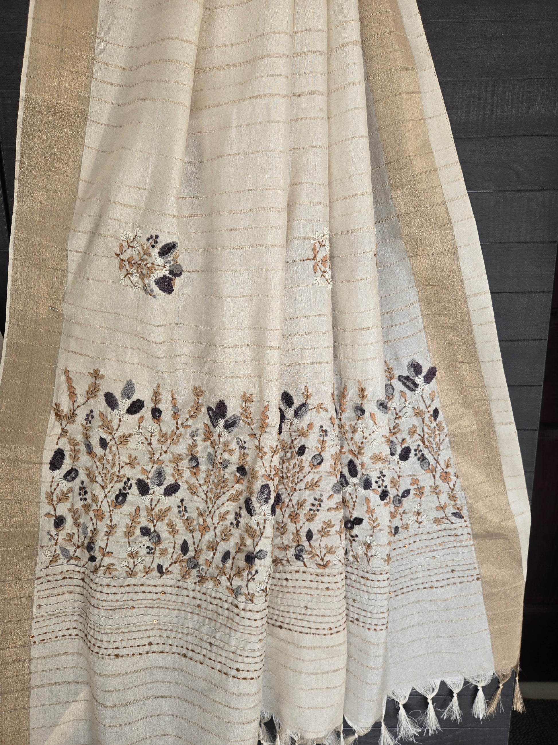 Styled Look: Tussar Saree with Hand Embroidery & Gold Border + Navy Blue Ready-Made Blouse