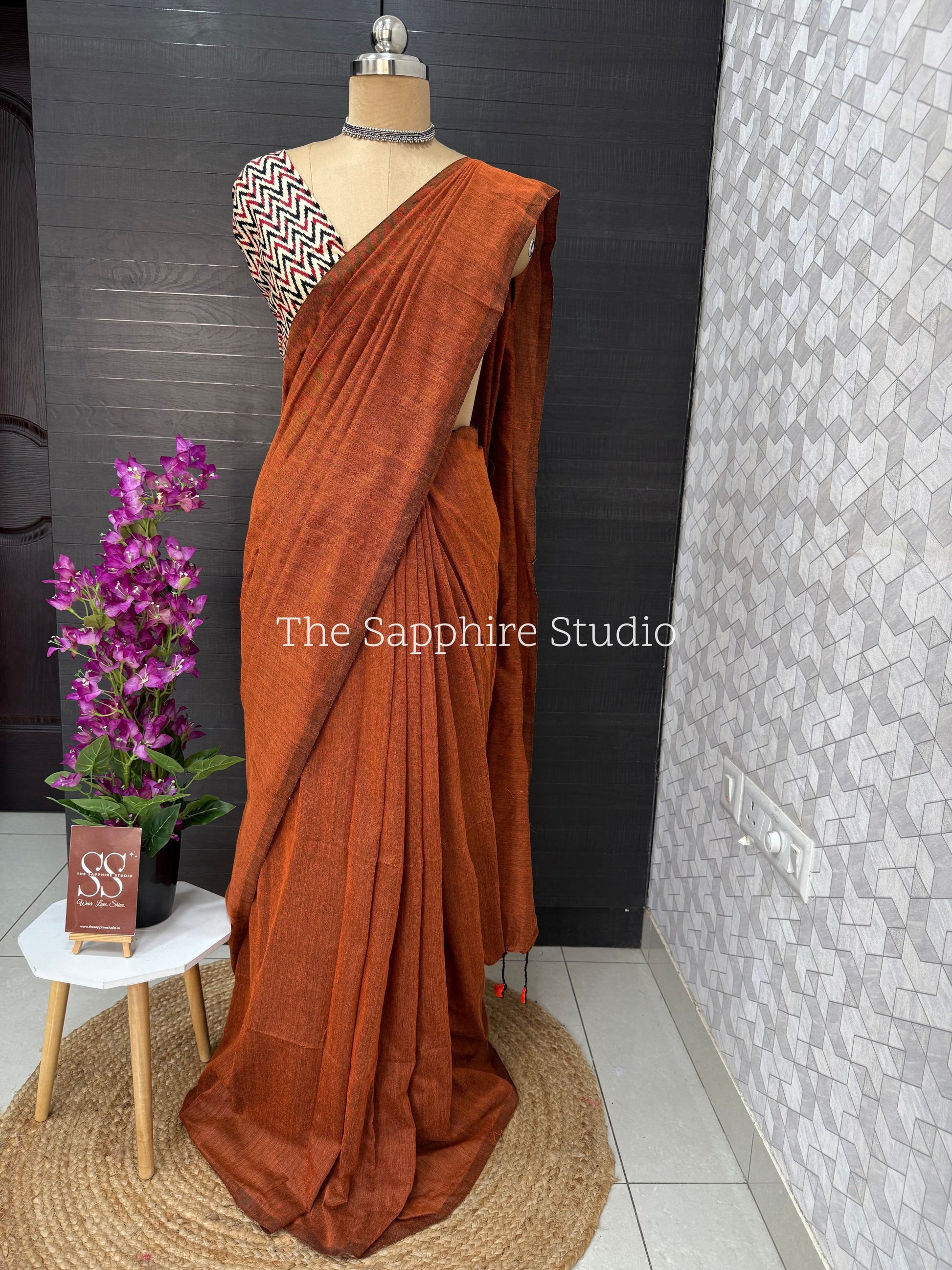 Rust Orange khadi cotton saree with Geometric Contrast Blouse