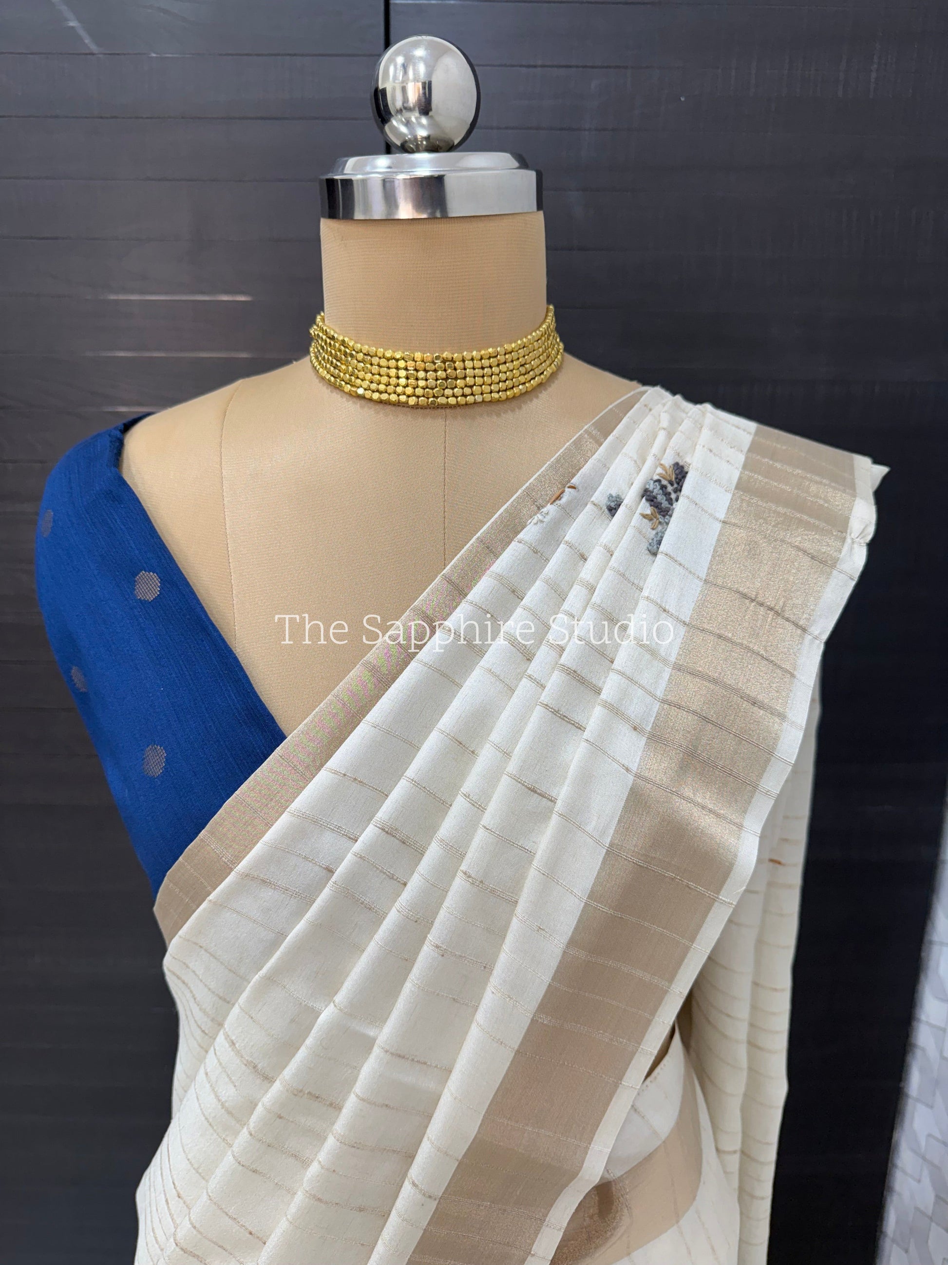 Onam/Vishu Tussar Saree with Hand Embroidery & Gold Border with contrast navy blue blouse piece