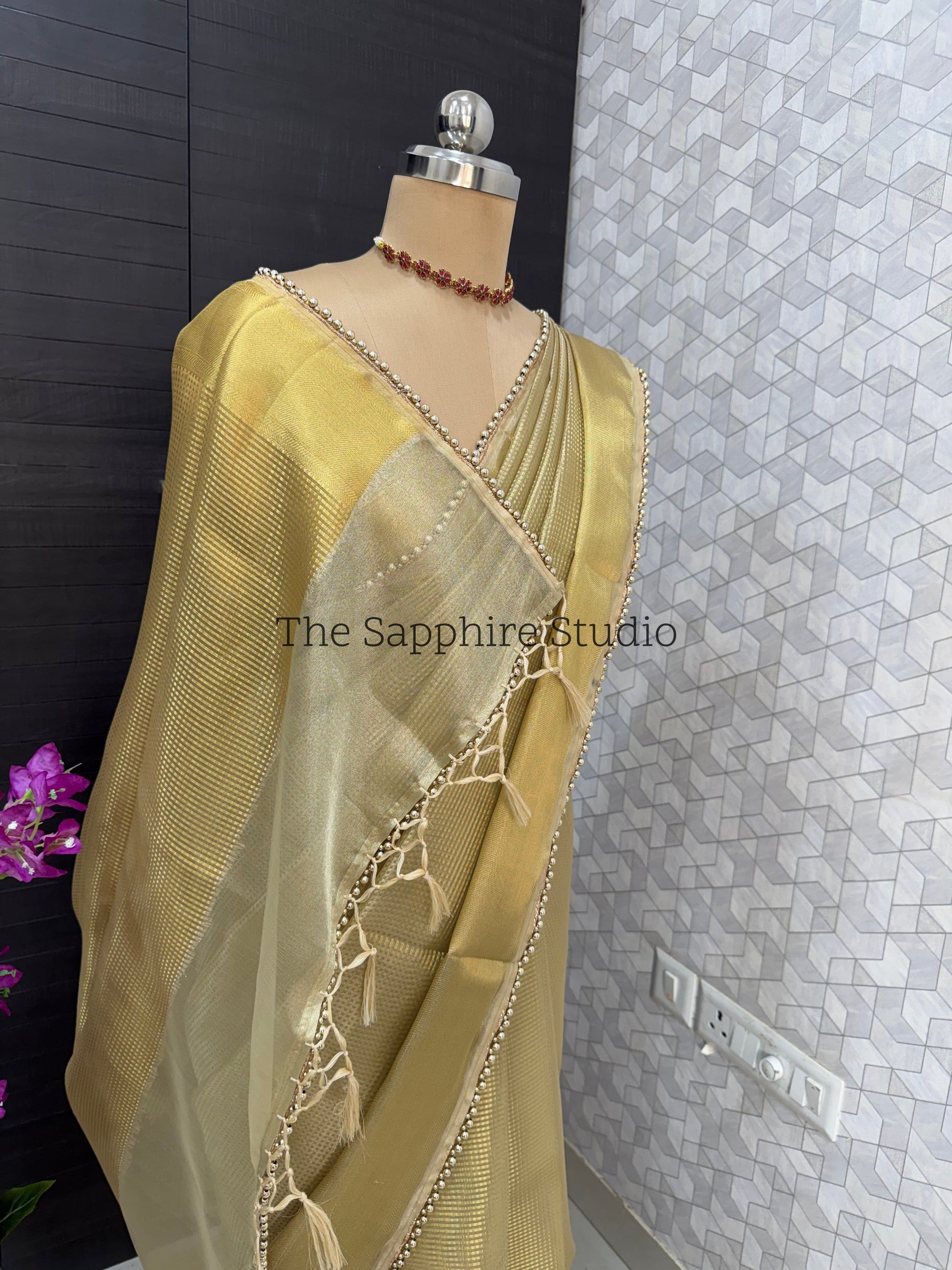 Tissue golden shade saree with lace border