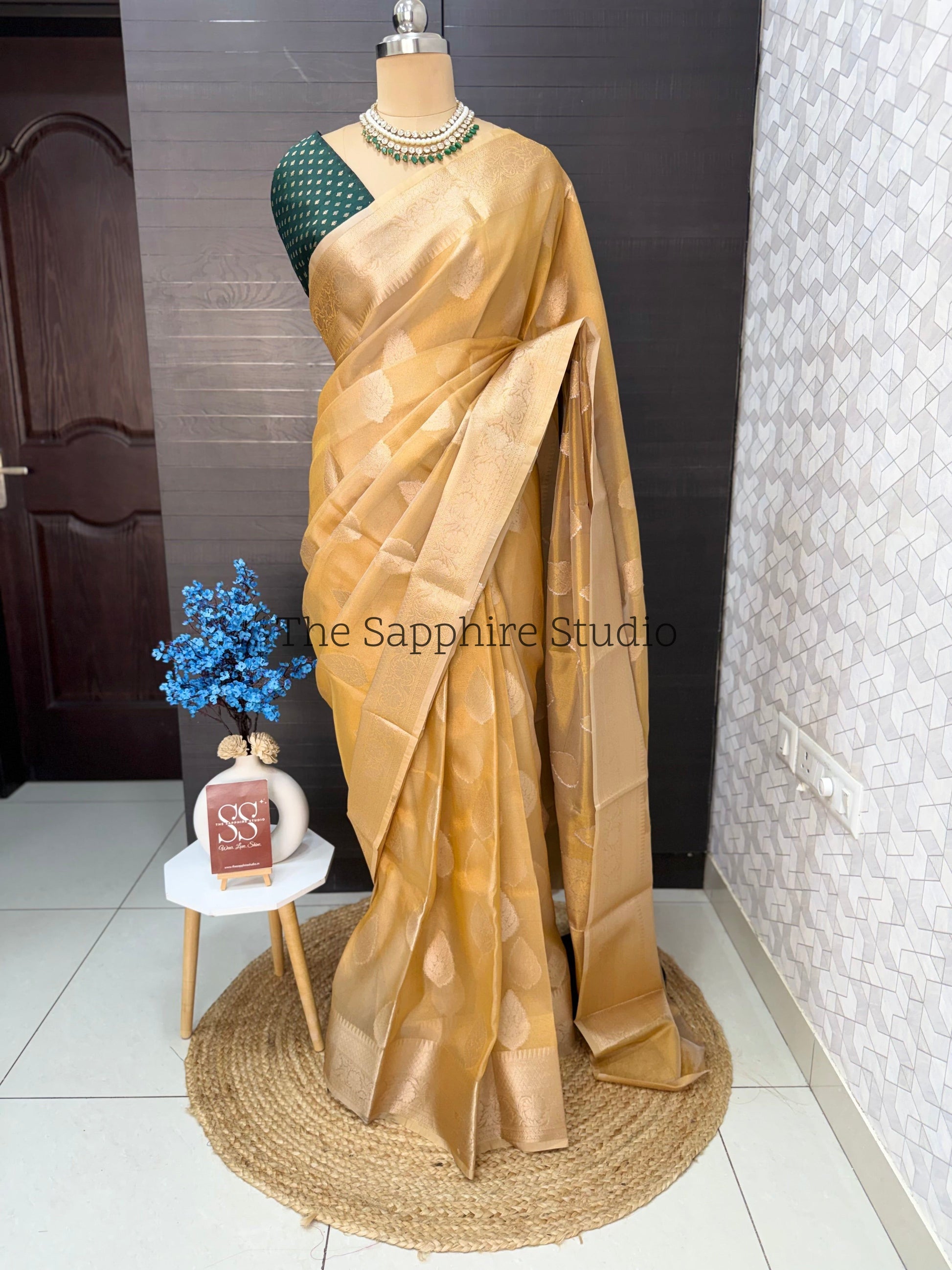 Golden Banarasi Tissue saree with contrast green blouse
