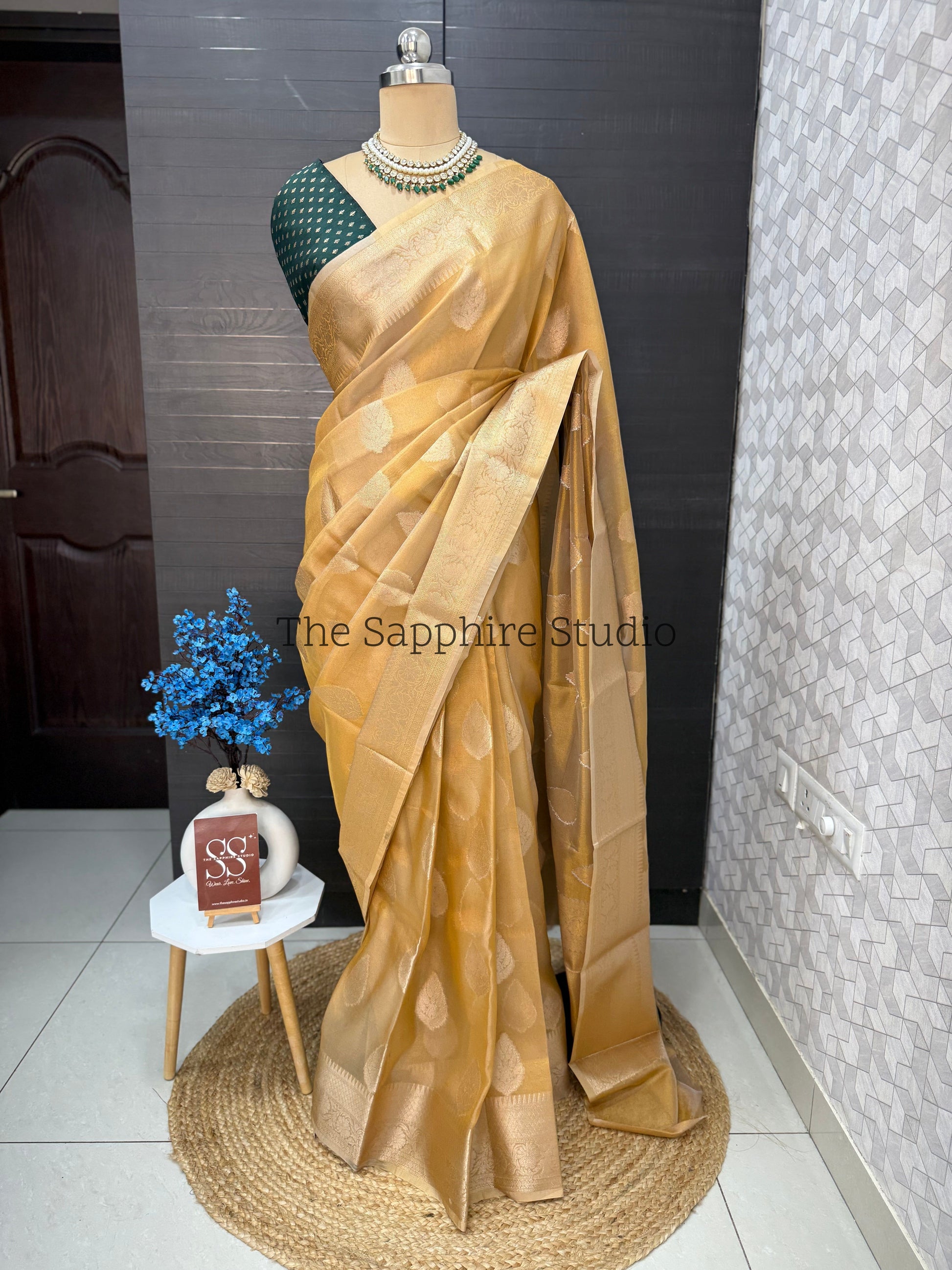 Golden Banarasi Tissue saree with contrast green blouse