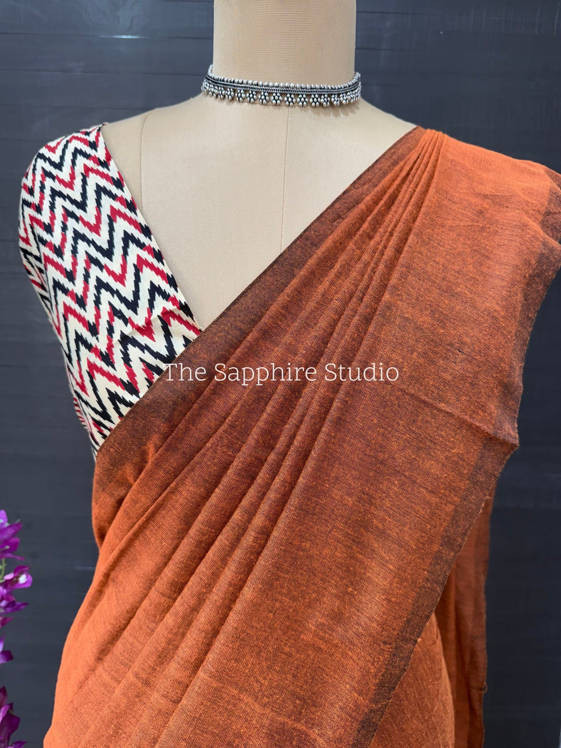 Rust Orange khadi cotton saree with Geometric Contrast Blouse