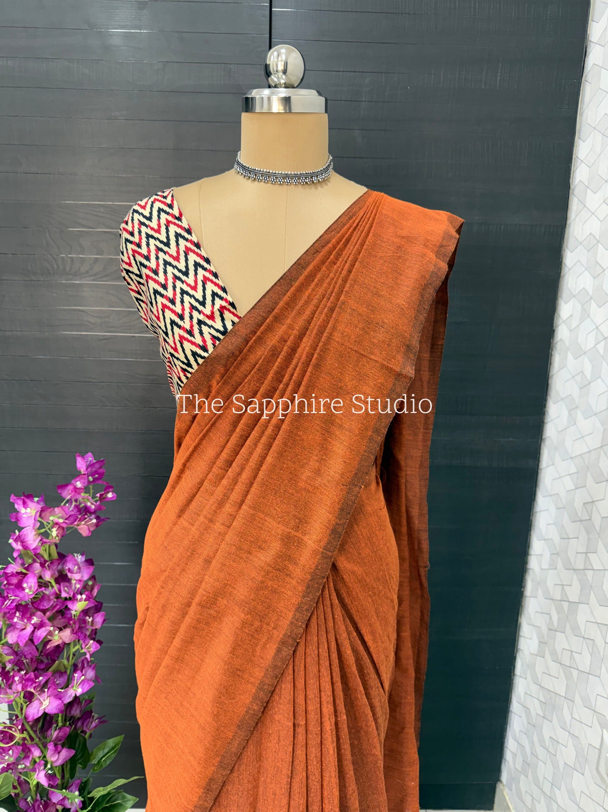Rust Orange khadi cotton saree with Geometric Contrast Blouse