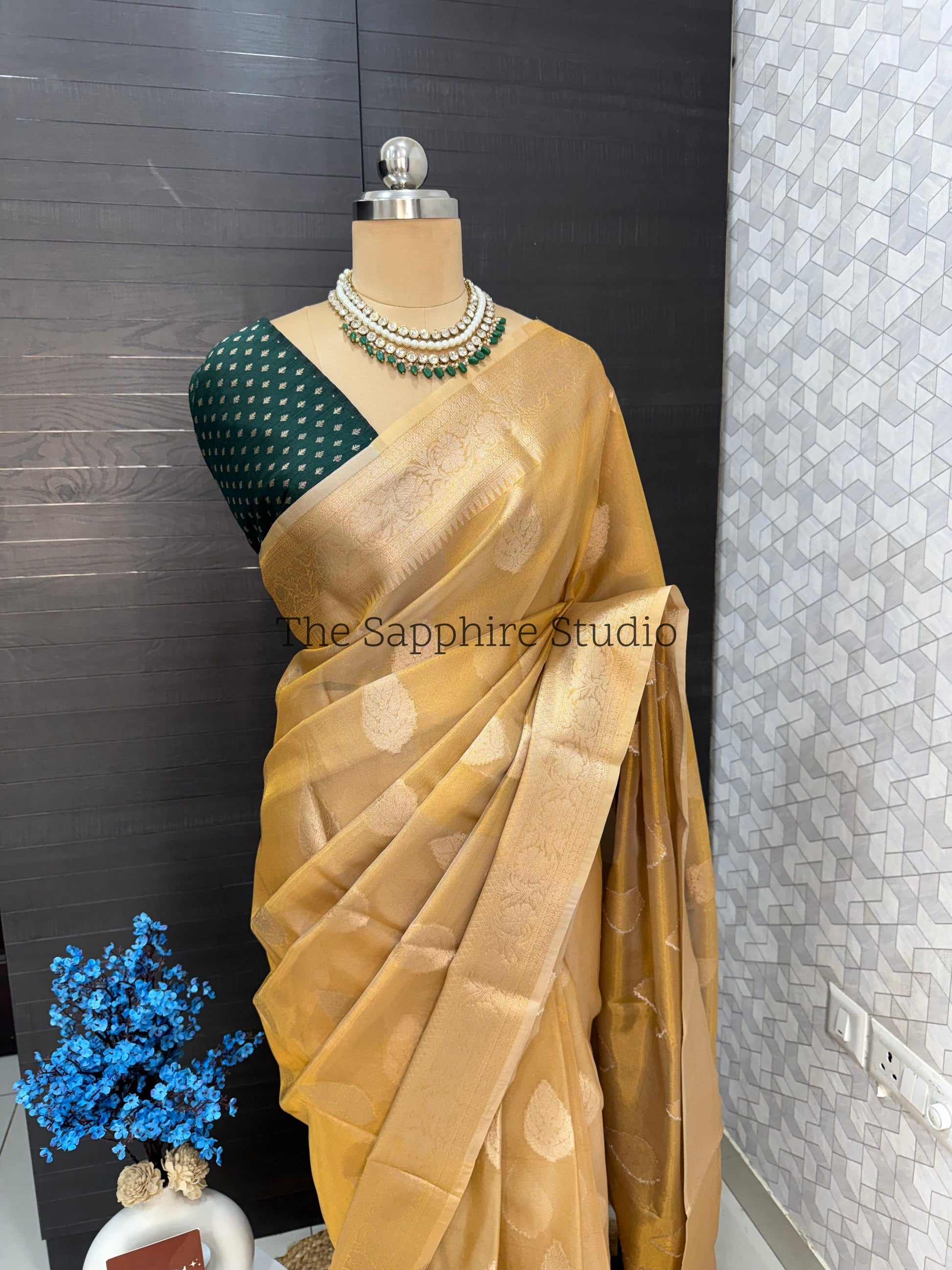 Golden Banarasi Tissue saree with contrast green blouse