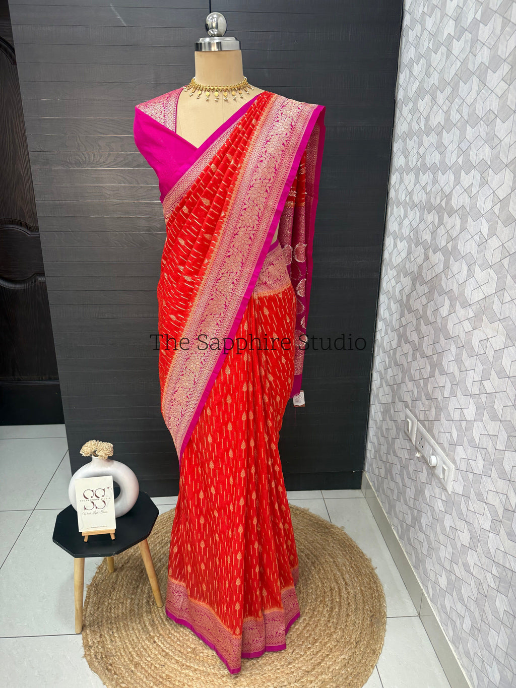 bright orange pink Banarasi georgette saree with floral zari motifs, elegant festive saree for weddings and cultural celebrations, designer saree India