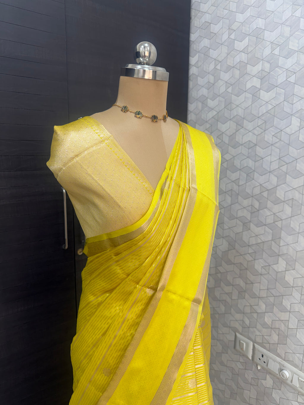 bright yellow Banarasi silk saree with all-over zari buti weaving and border, elegant haldi saree for wedding and festive occasions