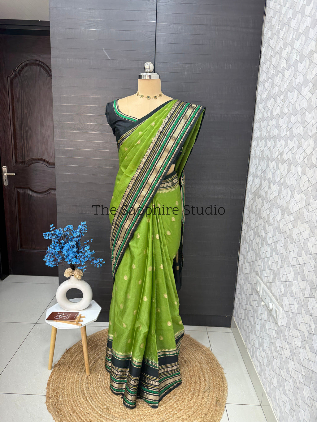 green Banarasi silk saree with black zari border, lightweight Chiniya silk saree for festive and wedding wear, traditional saree for women puja and celebration