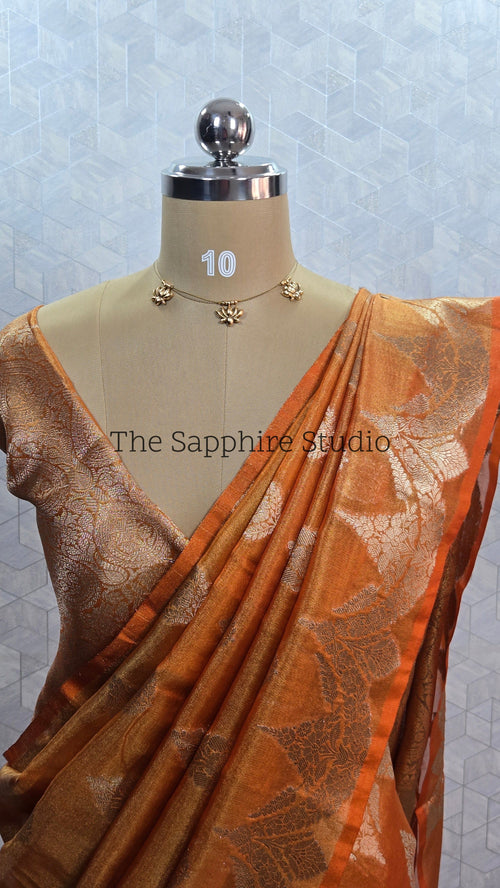 warm orange tissue silk saree with golden zari border, Banarasi saree for haldi and festive occasions, elegant lightweight wedding saree India