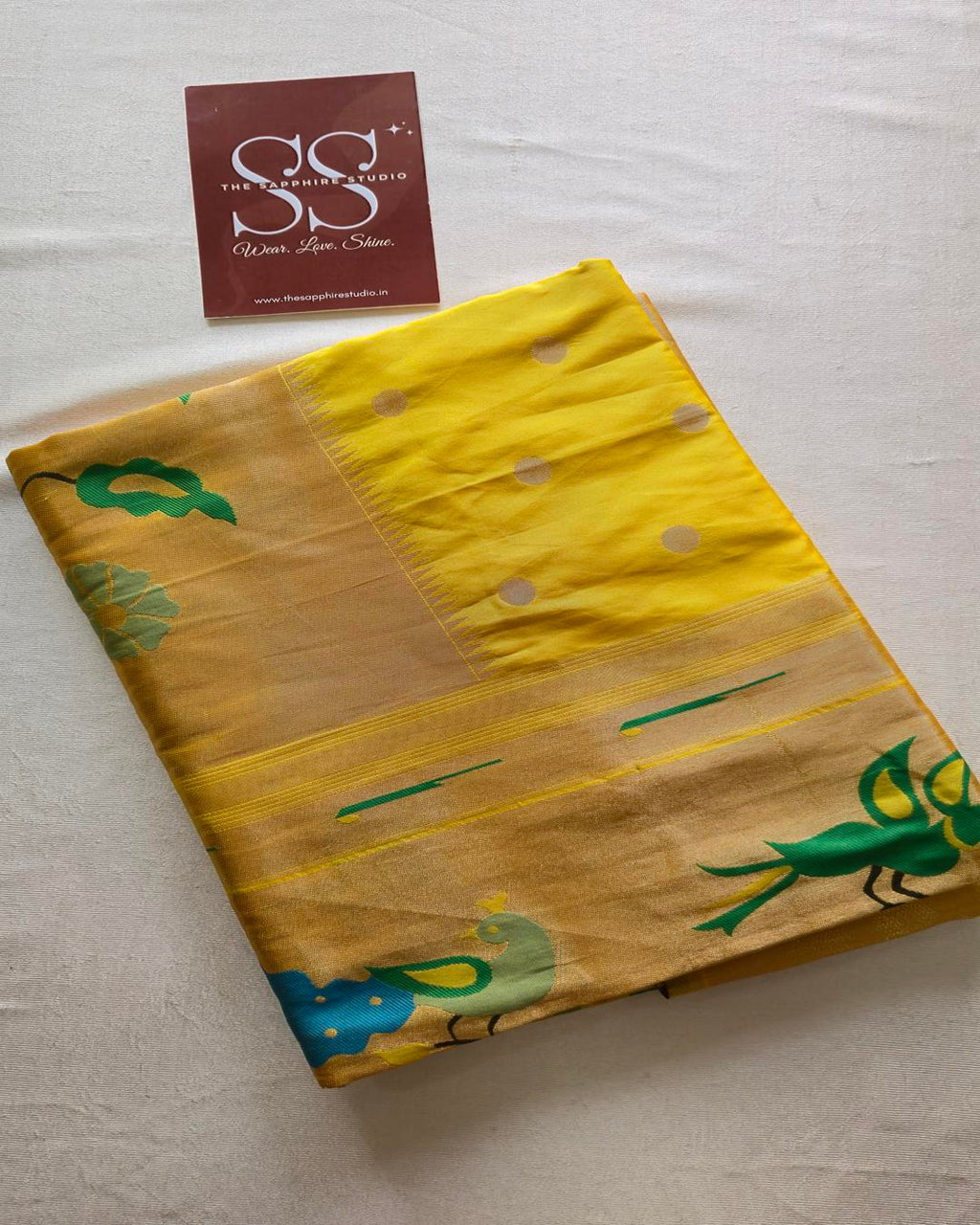 golden yellow Paithani saree with intricate Meena pallu and zari woven border, elegant silk saree for weddings, pujas and cultural celebrations