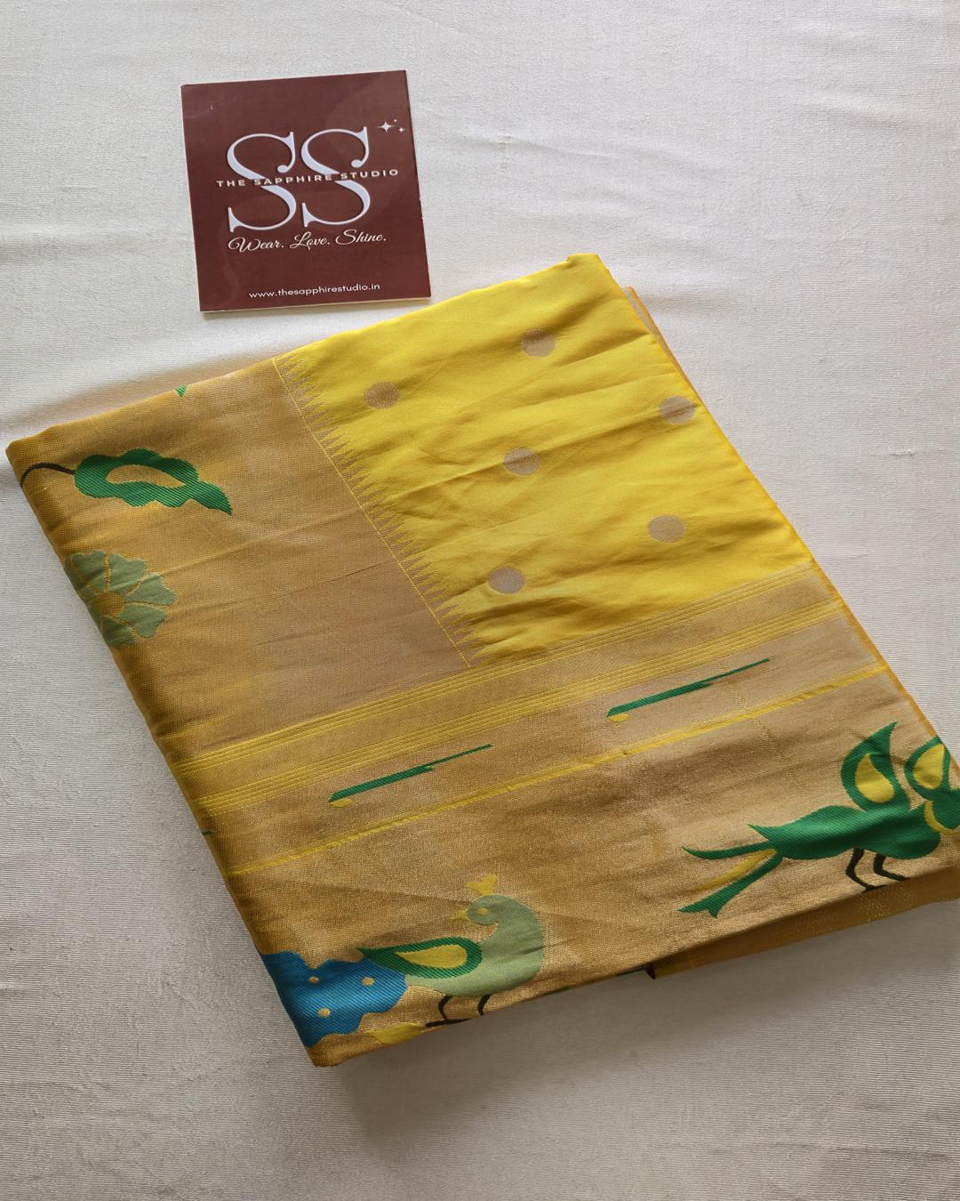 golden yellow Paithani saree with intricate Meena pallu and zari woven border, elegant silk saree for weddings, pujas and cultural celebrations